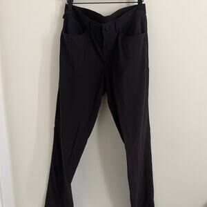 men’s black ALO YOGA day and night dress pant [31R]